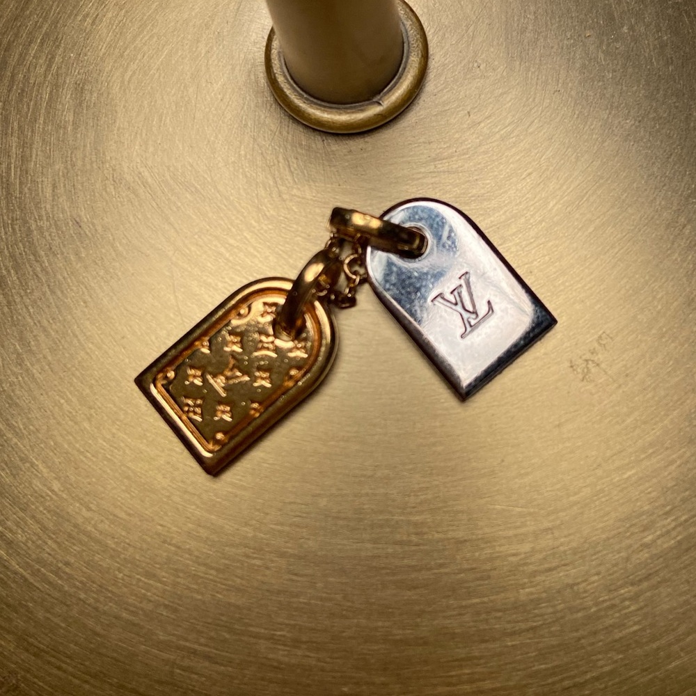 Authentic Louis Vuitton tag charm